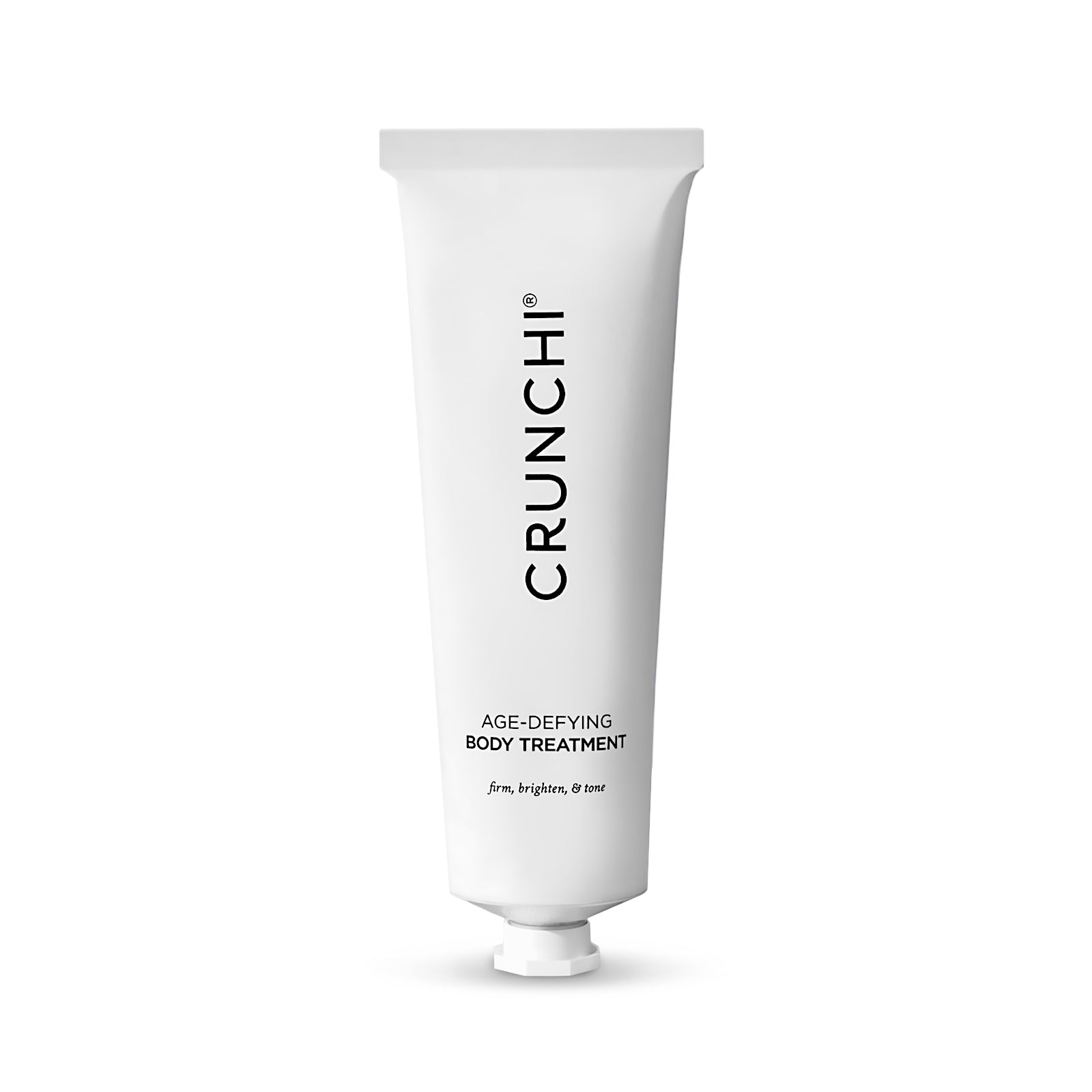 A white tube of Crunchi Age Defying Body Treatment with black text and design elements.