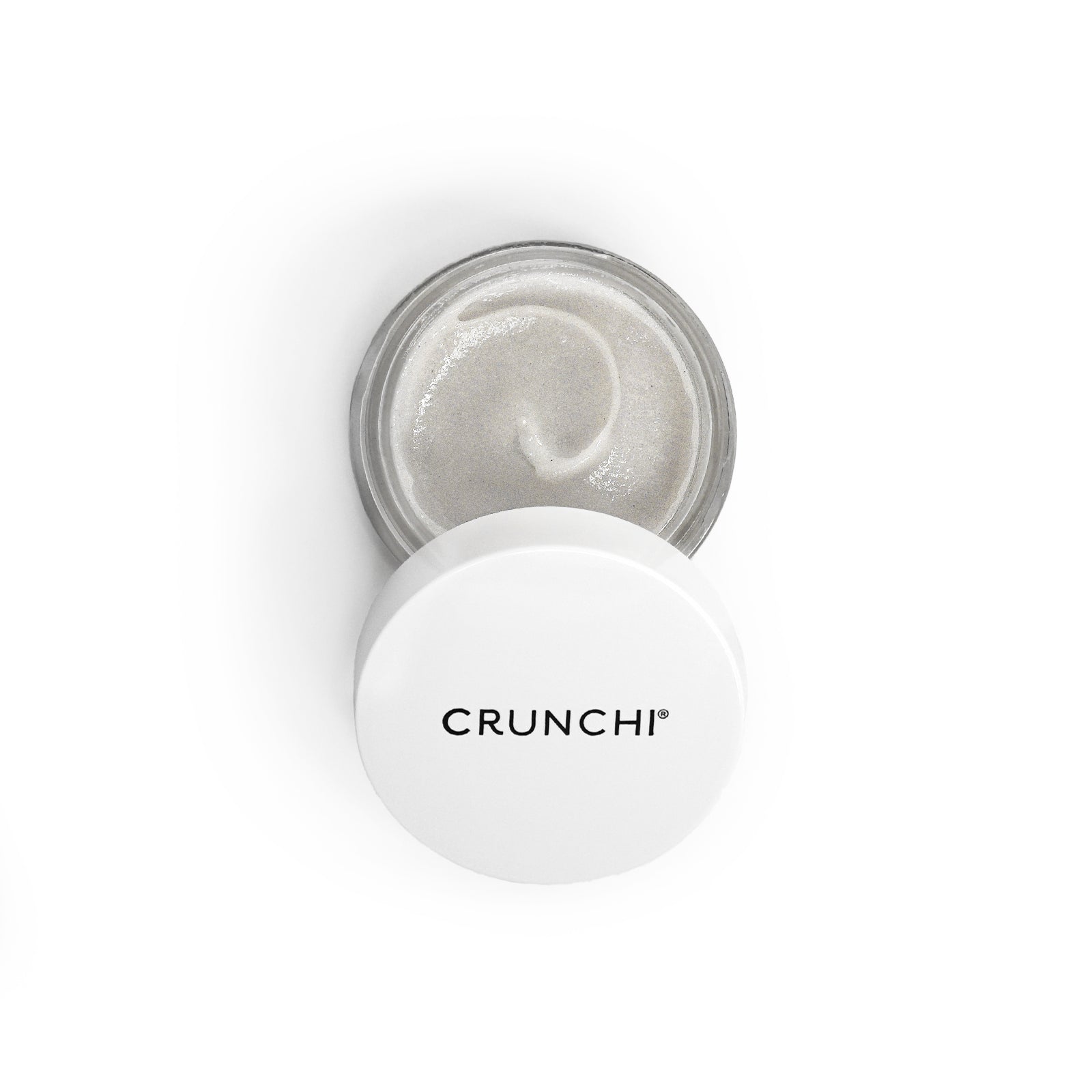 Jar of Crunchi cream with white lid on a white background