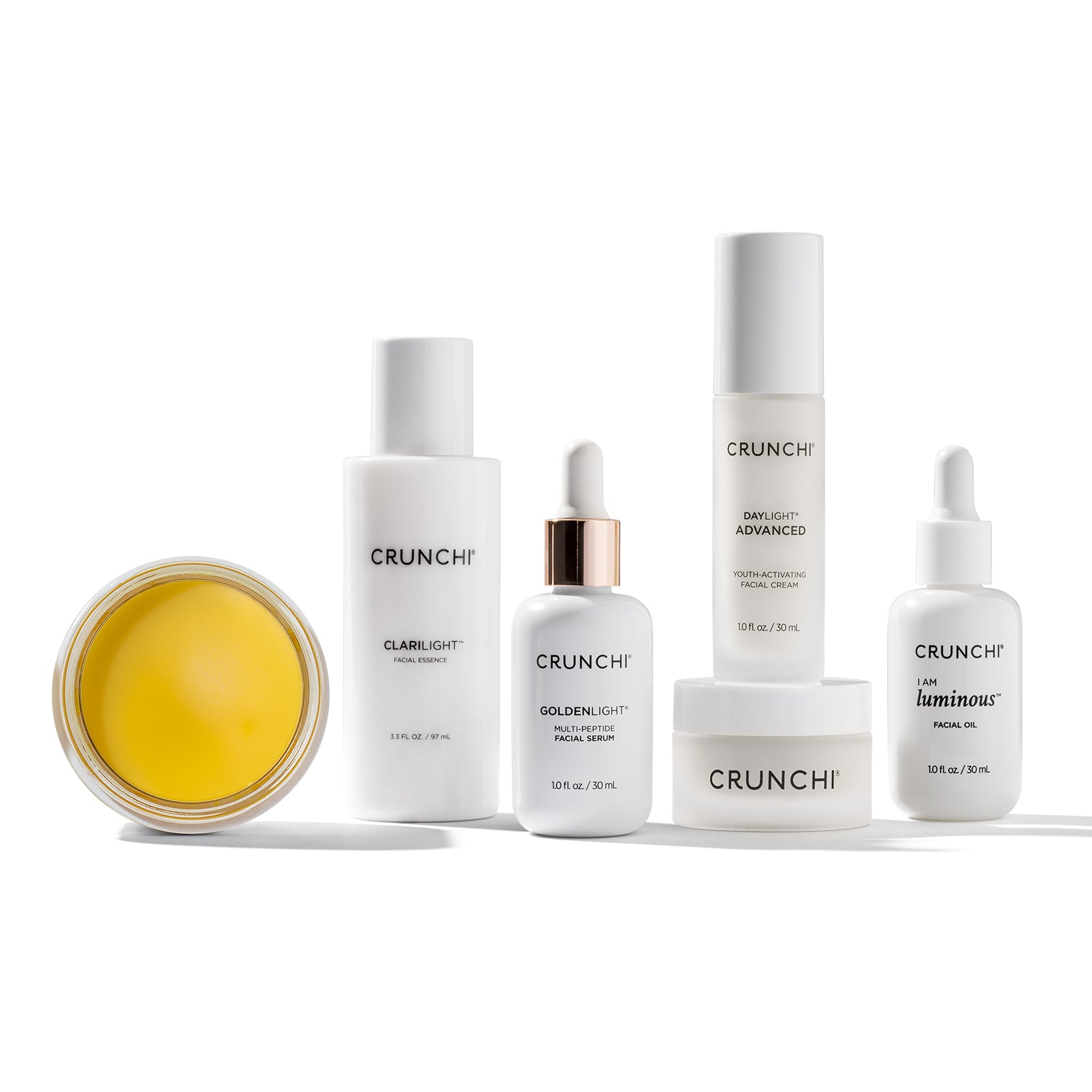 Collection of Crunchi skincare products on a white background