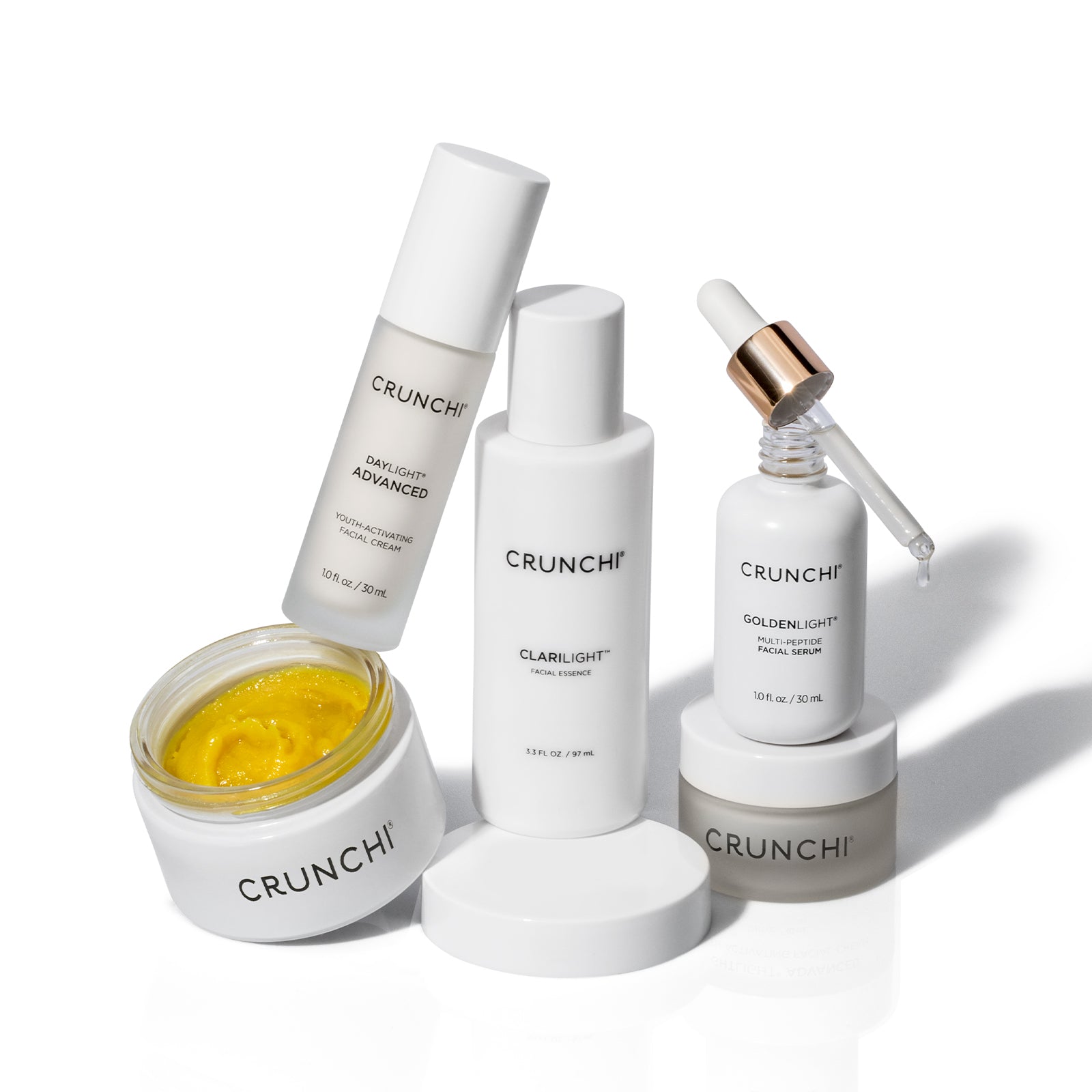 Collection of Crunchi skincare products on a white background