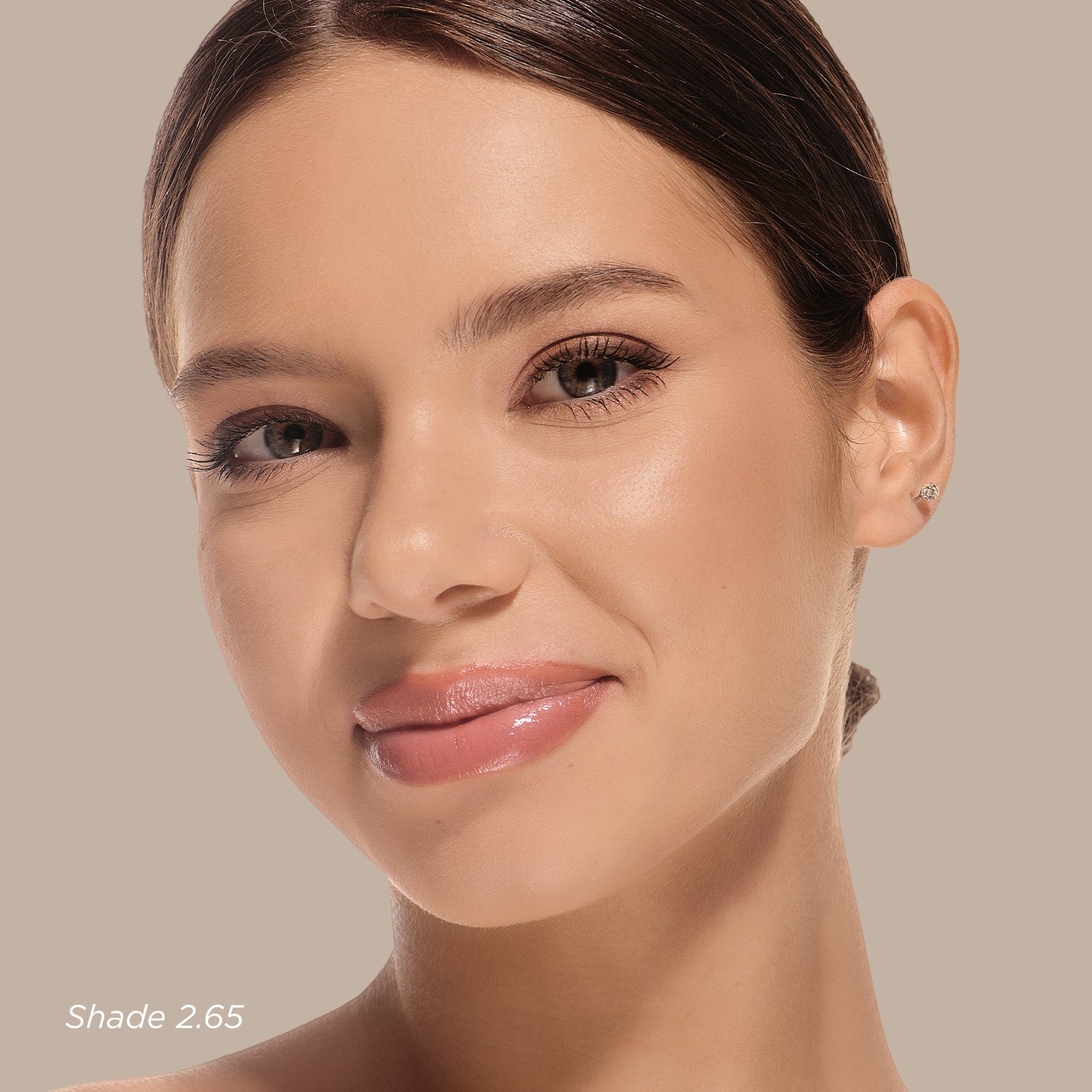 Beautifully Flawless Foundation shade 2.65 shown on woman's face