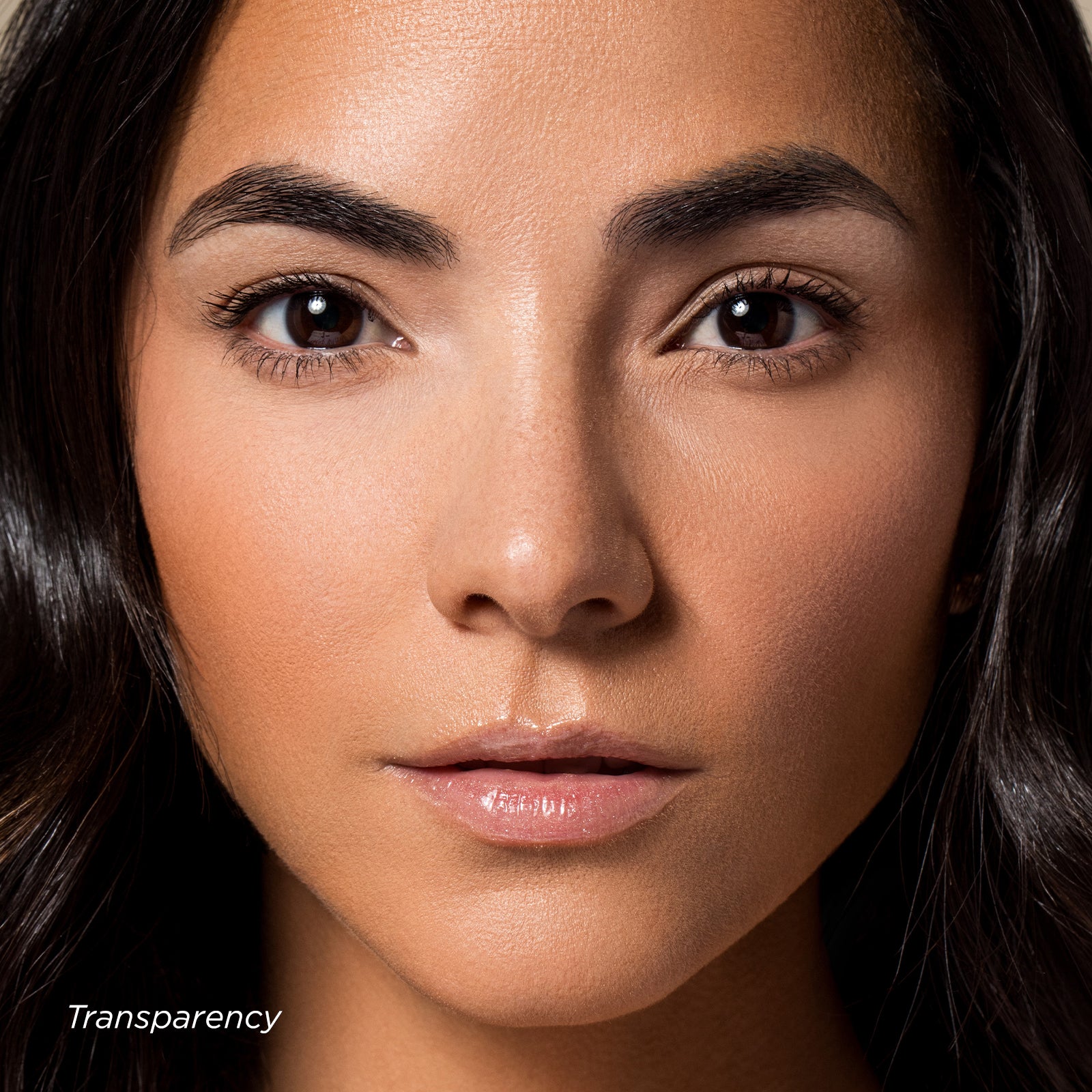 Close-up of a woman's face with a neutral expression