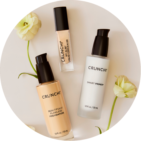 Three Crunchi products on a white background with flowers.